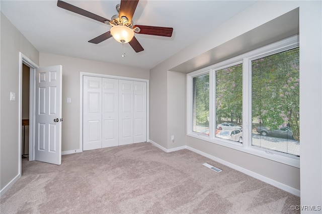 2750 Old Point Dr, Henrico, VA 23233 - unfurnished bedroom with carpet flooring, a closet, and a ceiling fan