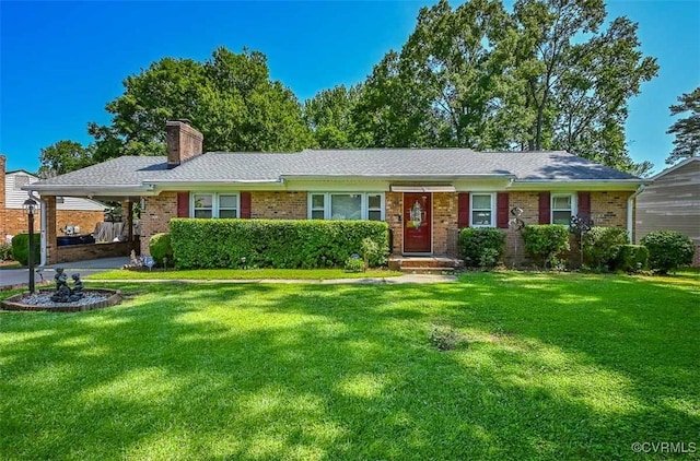 2931 Delfin Rd, Midlothian, VA 23112 - ranch-style home with brick siding, a front lawn, an attached carport, and a chimney