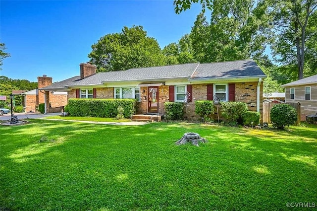 2931 Delfin Rd, Midlothian, VA 23112 - ranch-style home with a front lawn, a chimney, and brick siding