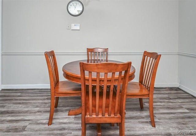 2931 Delfin Rd, Midlothian, VA 23112 - dining space with wood finished floors and baseboards
