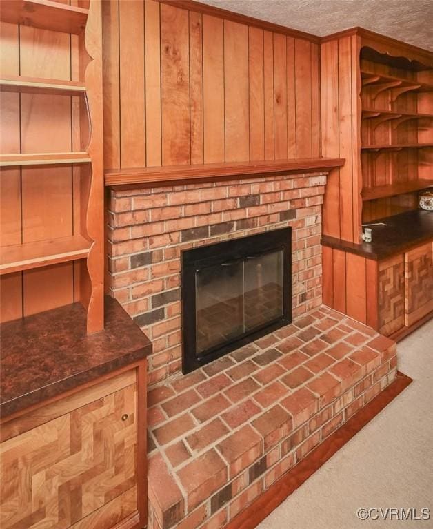 2931 Delfin Rd, Midlothian, VA 23112 - detailed view of a brick fireplace, carpet floors, and a textured ceiling