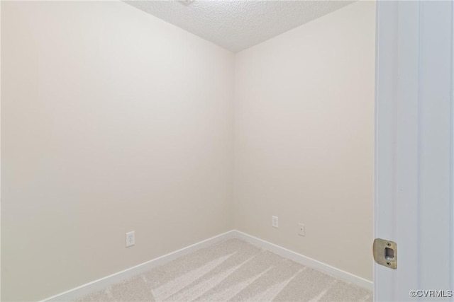 11830 Cedar Landing Ter, Chesterfield, VA 23831 - empty room featuring light carpet, a textured ceiling, and baseboards