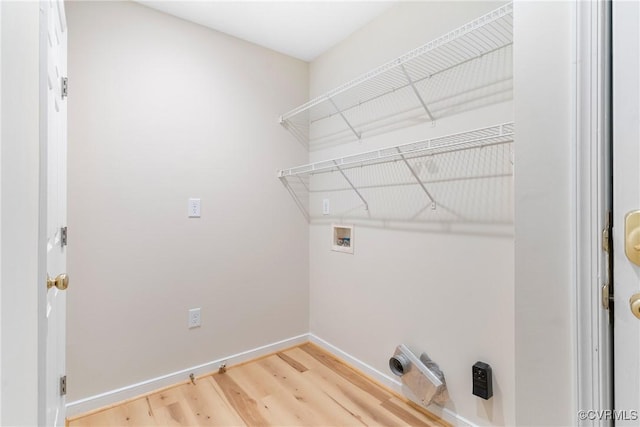 11830 Cedar Landing Ter, Chesterfield, VA 23831 - laundry area featuring hookup for a washing machine, light wood finished floors, and baseboards
