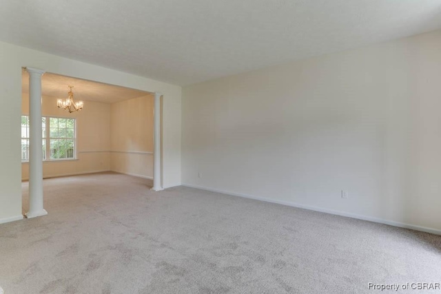 106 Haymaker Pl, Williamsburg, VA 23185 - carpeted spare room with a chandelier and baseboards