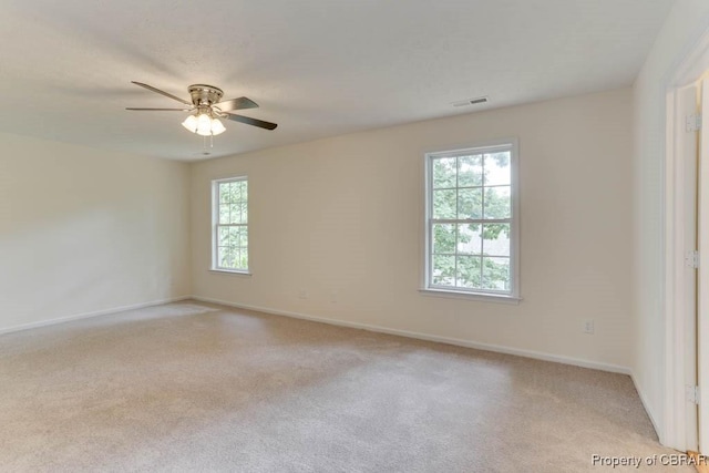 106 Haymaker Pl, Williamsburg, VA 23185 - spare room featuring light colored carpet, baseboards, and ceiling fan