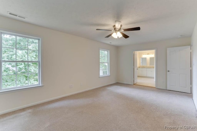 106 Haymaker Pl, Williamsburg, VA 23185 - unfurnished bedroom featuring baseboards, light colored carpet, ensuite bath, and ceiling fan