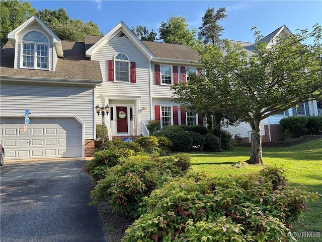 15023 Manor Gate Ct, Midlothian, VA 23112 - view of front of home with driveway, a garage, brick siding, a front yard, and roof with shingles