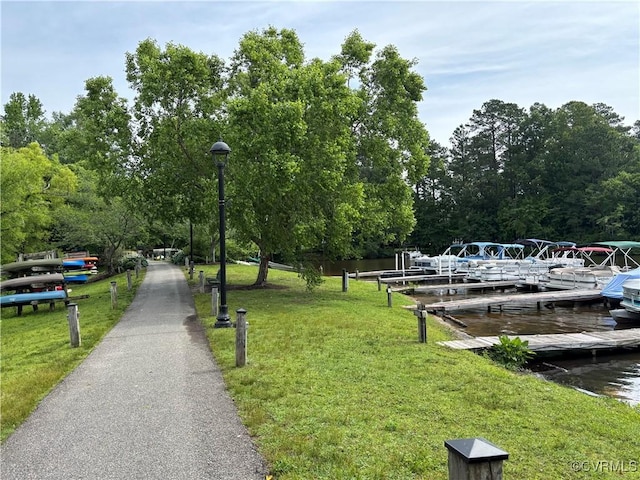 15023 Manor Gate Ct, Midlothian, VA 23112 - surrounding community featuring a yard, a dock, uncovered parking, and a water view