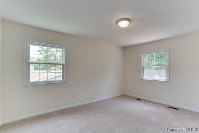 205 Captains Ct, Hampton, VA 23669 - spare room with carpet and baseboards