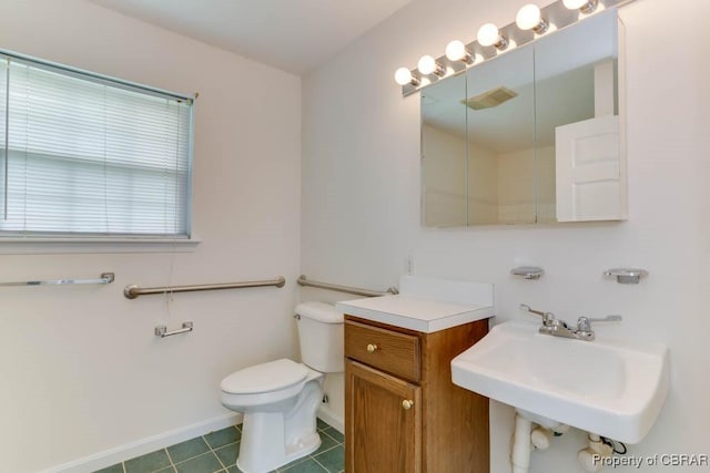205 Captains Ct, Hampton, VA 23669 - bathroom with toilet, baseboards, tile patterned floors, and a sink