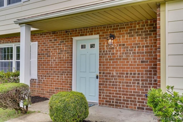 205 Captains Ct, Hampton, VA 23669 - view of exterior entry featuring brick siding