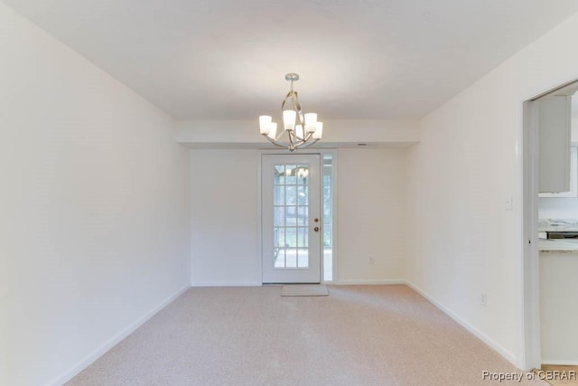 205 Captains Ct, Hampton, VA 23669 - unfurnished dining area with a chandelier, light carpet, and baseboards