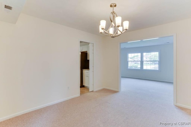 205 Captains Ct, Hampton, VA 23669 - empty room featuring a chandelier, light colored carpet, and baseboards