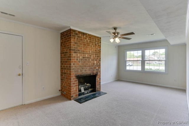 205 Captains Ct, Hampton, VA 23669 - unfurnished living room featuring ceiling fan, carpet floors, a brick fireplace, baseboards, and ornamental molding