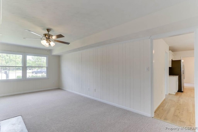 205 Captains Ct, Hampton, VA 23669 - spare room featuring ceiling fan, baseboards, and light colored carpet