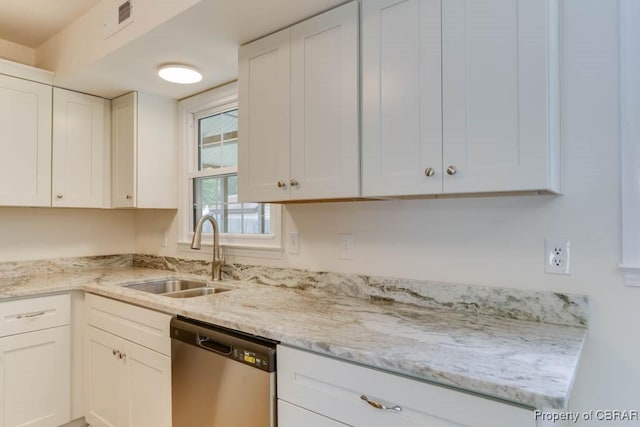205 Captains Ct, Hampton, VA 23669 - kitchen with stainless steel dishwasher, a sink, white cabinetry, and light stone counters