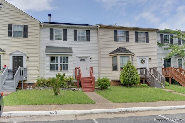 1603 Skiffes Creek Cir, Williamsburg, VA 23185 - multi unit property with a front yard