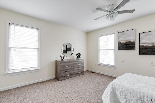 12321 Boxford Ln, Chesterfield, VA 23114 - bedroom with light colored carpet, baseboards, and ceiling fan