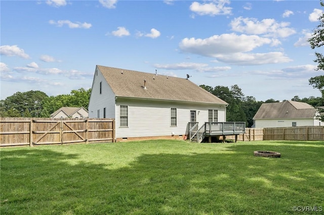 8145 Ashby Ridge Pl, Mechanicsville, VA 23111 - rear view of property with a fire pit, a deck, a fenced backyard, crawl space, and roof with shingles