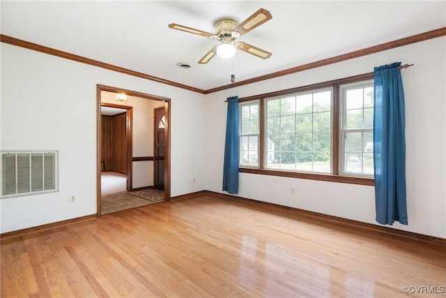 7708 Walnut Cir, Quinton, VA 23141 - spare room featuring light wood-style flooring, baseboards, a ceiling fan, and ornamental molding