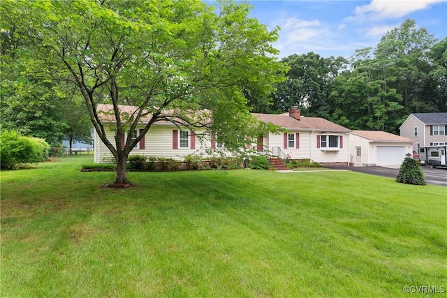 7708 Walnut Cir, Quinton, VA 23141 - ranch-style home featuring driveway, a garage, a front lawn, and a chimney