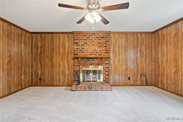 7708 Walnut Cir, Quinton, VA 23141 - unfurnished living room with carpet flooring, ceiling fan, wooden walls, baseboards, and a fireplace