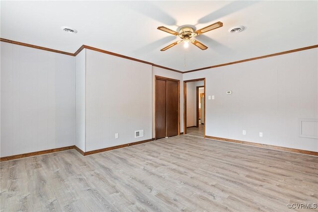 7708 Walnut Cir, Quinton, VA 23141 - empty room featuring light wood-style flooring, a ceiling fan, ornamental molding, and baseboards