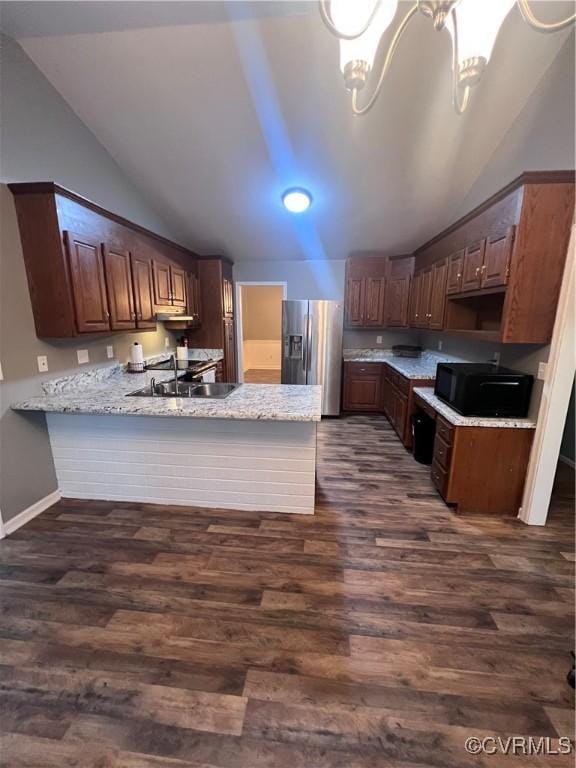 3539 Spring Meadow Pl, Prince George, VA 23860 - kitchen featuring stainless steel fridge, vaulted ceiling, black microwave, dark wood-style flooring, and a peninsula