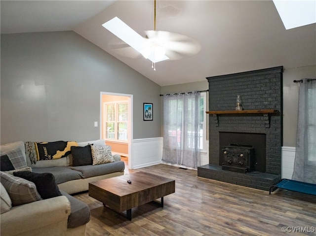 3539 Spring Meadow Pl, Prince George, VA 23860 - living room with a skylight, wainscoting, wood finished floors, a ceiling fan, and high vaulted ceiling