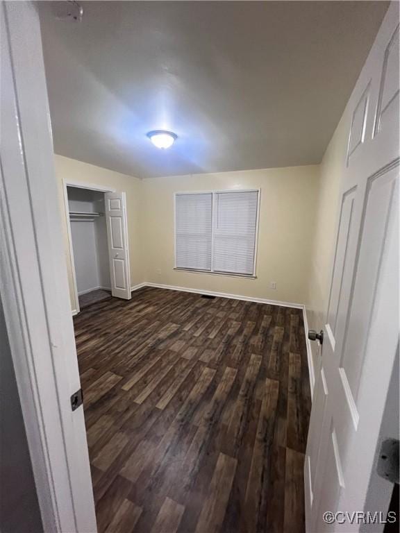 3539 Spring Meadow Pl, Prince George, VA 23860 - unfurnished bedroom featuring dark wood finished floors and a closet