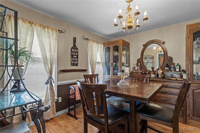 9540 Alfaree Rd, Chesterfield, VA 23237 - dining space featuring a chandelier, healthy amount of natural light, and light wood-style floors
