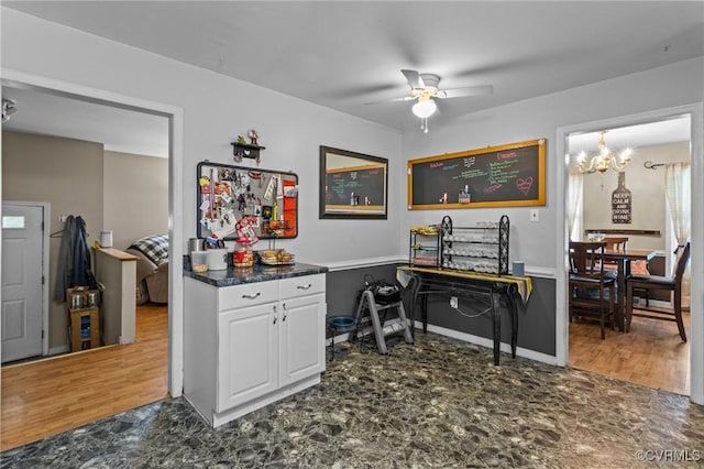 9540 Alfaree Rd, Chesterfield, VA 23237 - home office with ceiling fan and a chandelier
