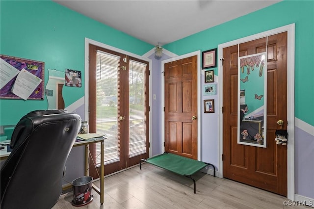 9540 Alfaree Rd, Chesterfield, VA 23237 - home office featuring light wood-style flooring, french doors, and healthy amount of natural light