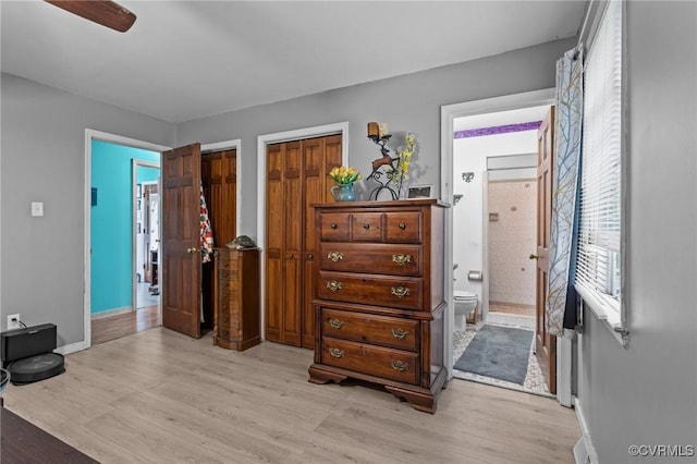 9540 Alfaree Rd, Chesterfield, VA 23237 - bedroom featuring light wood finished floors, ensuite bathroom, two closets, and a ceiling fan