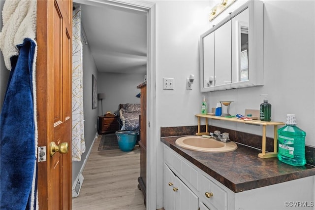 9540 Alfaree Rd, Chesterfield, VA 23237 - bathroom with vanity and wood finished floors