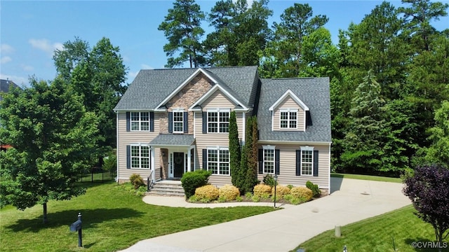 11706 Black Alder Dr, Moseley, VA 23120 - view of front facade featuring a front yard and roof with shingles