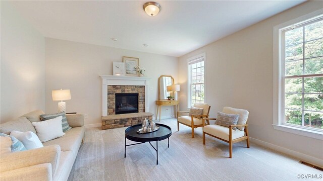 11706 Black Alder Dr, Moseley, VA 23120 - living room with plenty of natural light, a fireplace, and baseboards