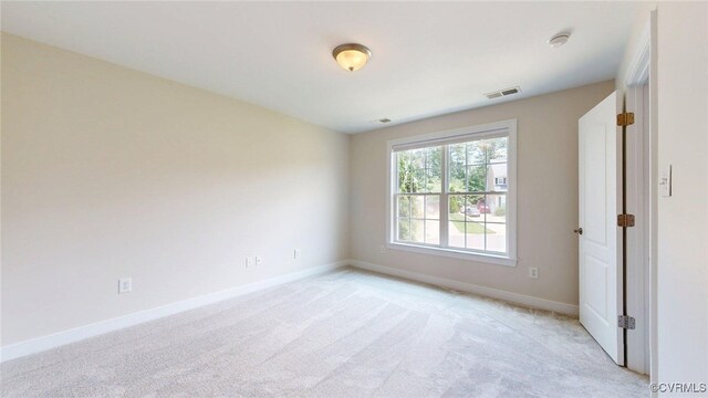 11706 Black Alder Dr, Moseley, VA 23120 - empty room with baseboards and light carpet