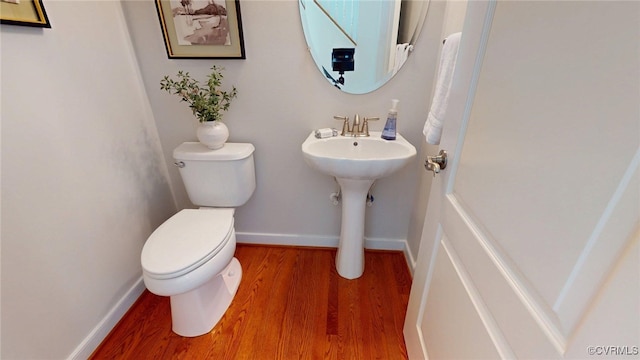 11706 Black Alder Dr, Moseley, VA 23120 - bathroom featuring toilet, wood finished floors, baseboards, and a sink