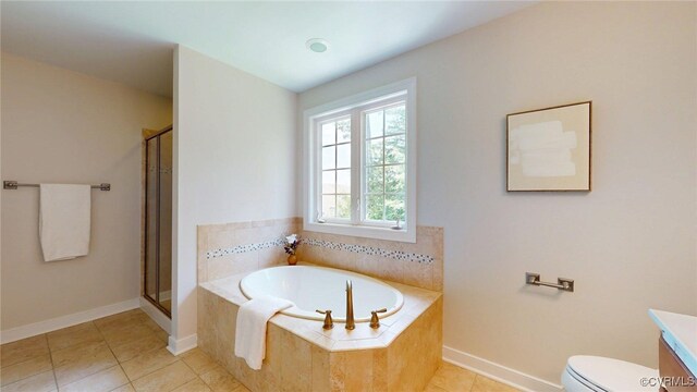 11706 Black Alder Dr, Moseley, VA 23120 - bathroom featuring a garden tub, toilet, tile patterned floors, vanity, and baseboards
