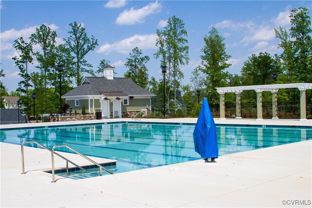 11706 Black Alder Dr, Moseley, VA 23120 - community pool with a pergola and a patio