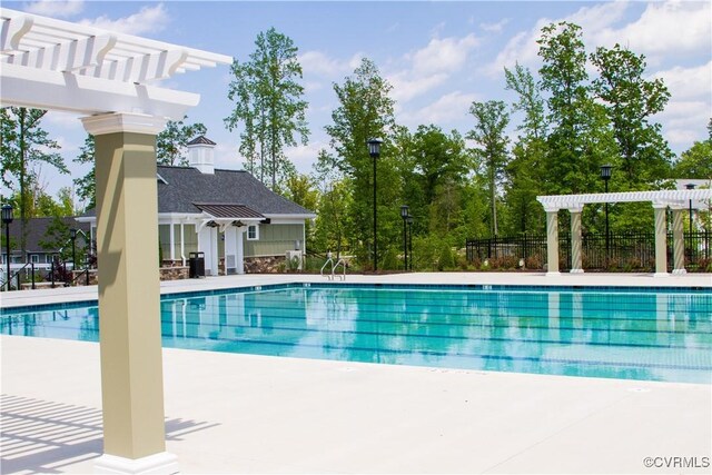 11706 Black Alder Dr, Moseley, VA 23120 - community pool featuring a pergola and a patio area