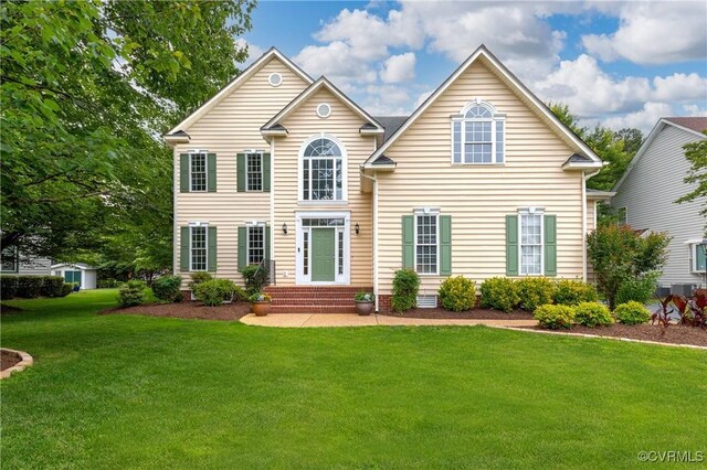 8940 Kings Charter Dr, Hanover, VA 23116 - view of front facade featuring a front yard