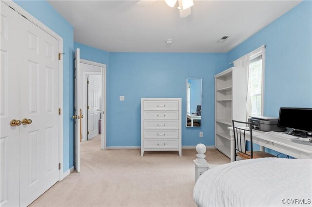 8940 Kings Charter Dr, Hanover, VA 23116 - bedroom featuring light colored carpet, a desk, and a ceiling fan