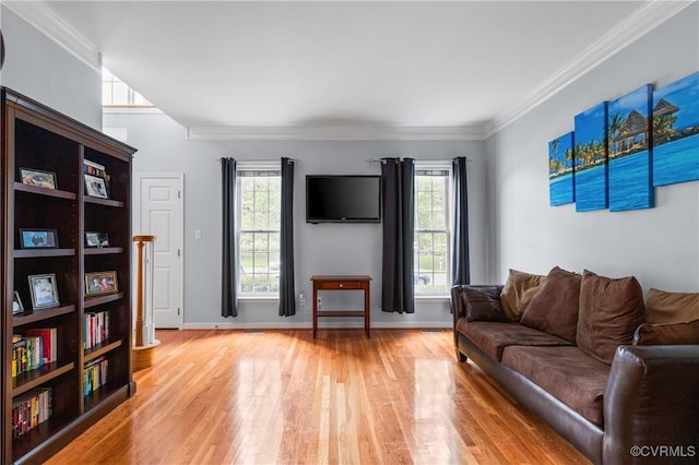 8940 Kings Charter Dr, Hanover, VA 23116 - living room with plenty of natural light, light wood-style flooring, and crown molding