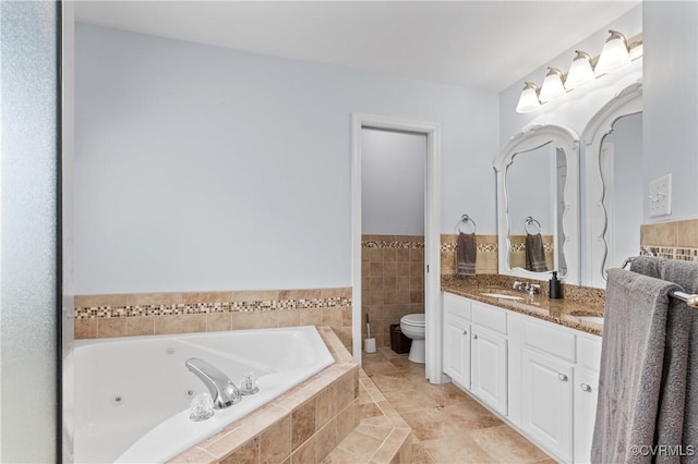 8940 Kings Charter Dr, Hanover, VA 23116 - full bath with a tub with jets, vanity, and a wainscoted wall