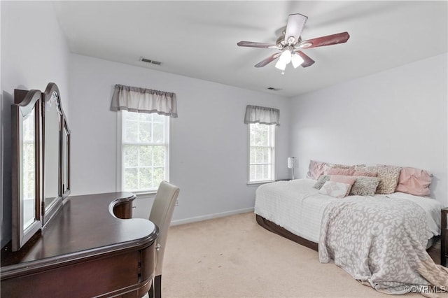 8940 Kings Charter Dr, Hanover, VA 23116 - bedroom featuring light carpet, a ceiling fan, and a desk
