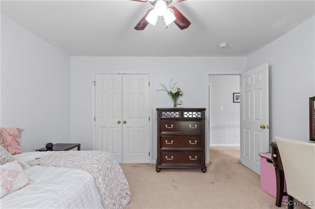 8940 Kings Charter Dr, Hanover, VA 23116 - bedroom with light colored carpet, a closet, and ceiling fan