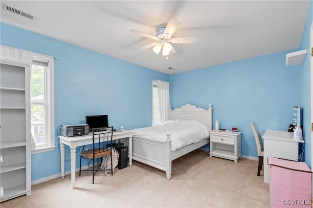 8940 Kings Charter Dr, Hanover, VA 23116 - carpeted bedroom with a desk and ceiling fan