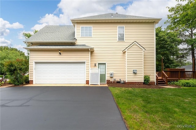8940 Kings Charter Dr, Hanover, VA 23116 - view of front facade featuring driveway, a wooden deck, a front yard, and roof with shingles